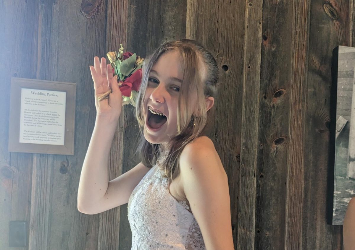 Izzie Walters at a friends quincenera posing