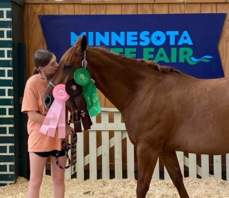 Sophie Jones with her horse, Phoenix, at the Minnesota State Fair.