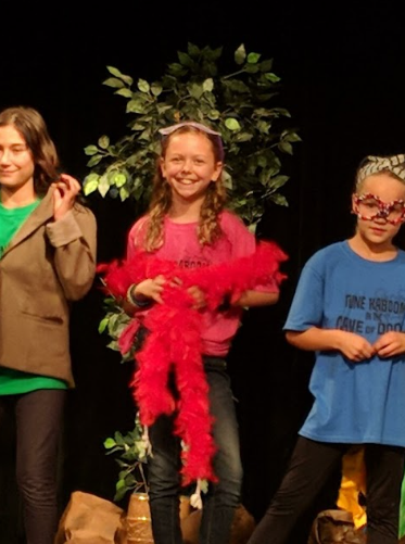 Lyla Glinsek, Gabrielle, performing in a theatre production during elementary school.