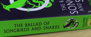 Ms. Steilows copy of The Ballad of Songbirds and Snakes that sits on her classroom shelf.