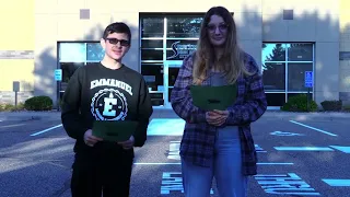 Bella and Tucker anchoring outside of the school.