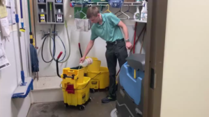 Preparing to mop the floor