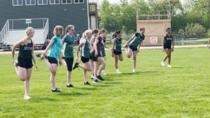 Students warm up at track meet.