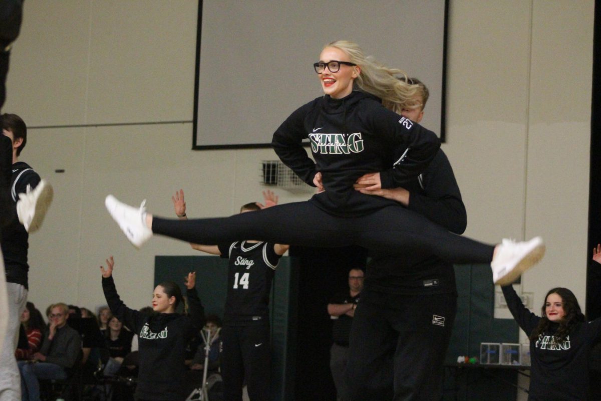 Dancers teach the basketball team how to get their groove on