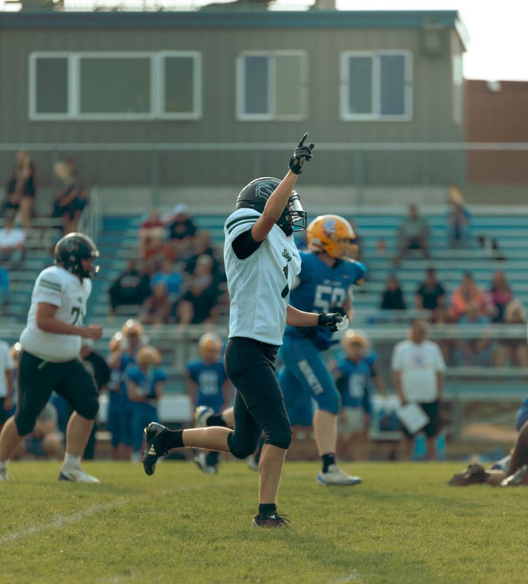 Spectrum varsity player celebrates the team getting a touchdown on September 5th 2025. Photo by Josiah Carlson.