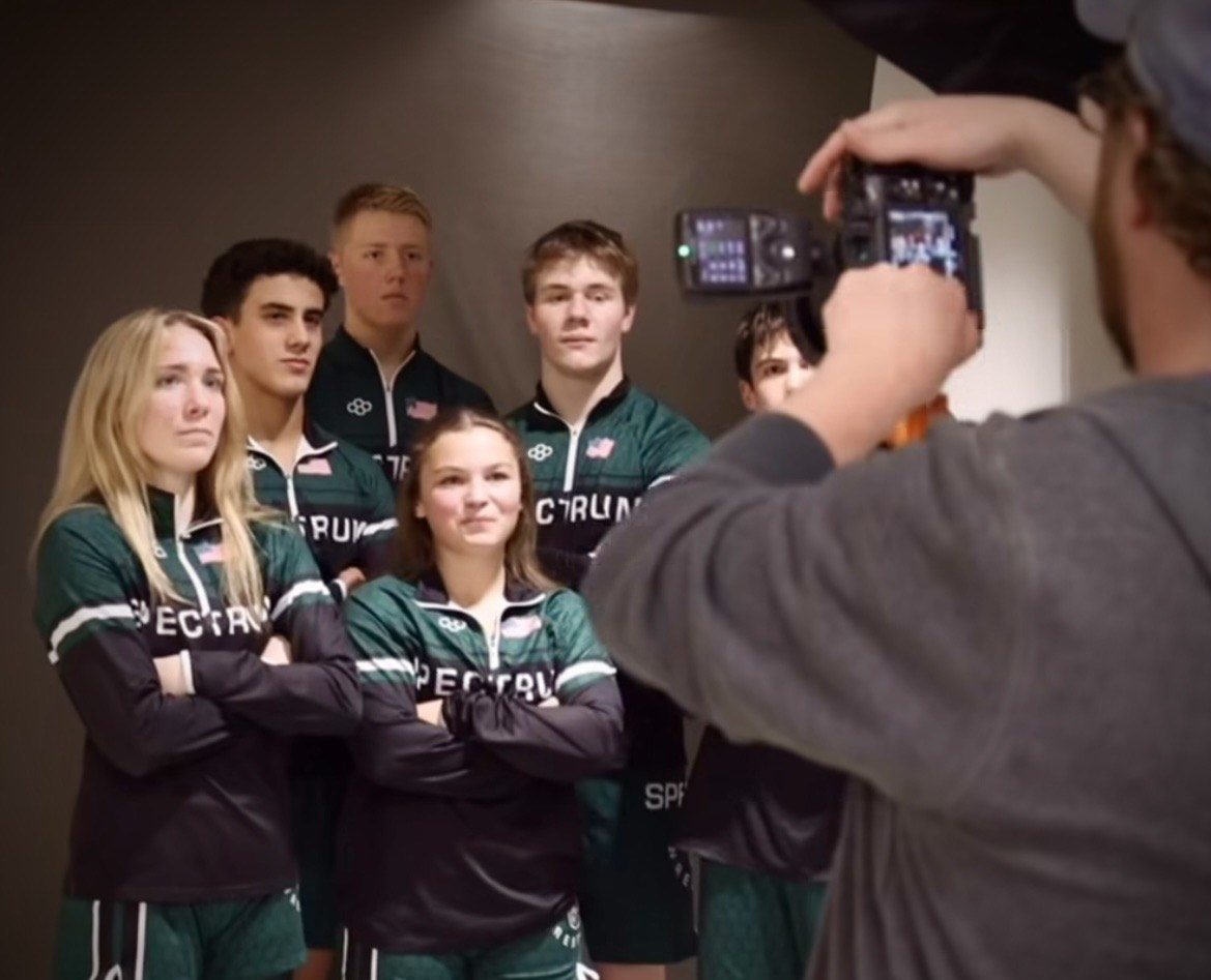 Wrestling captains taking photos at media day