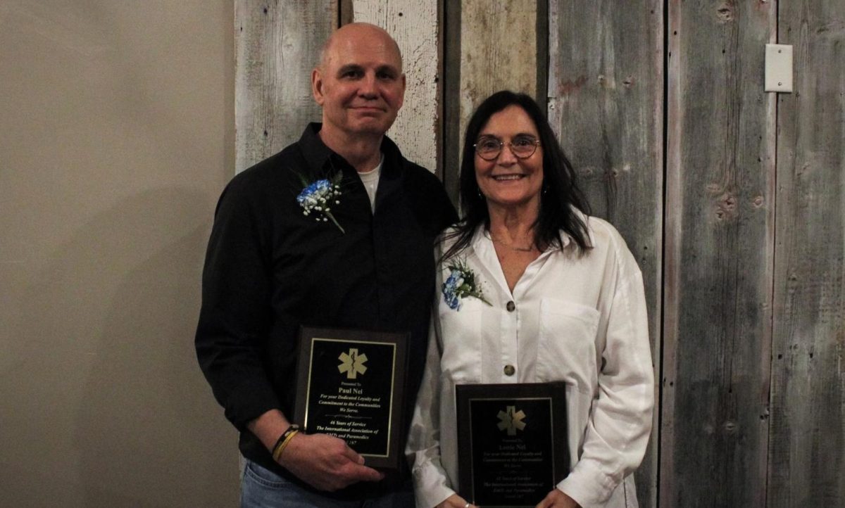 Paul Nei and Lonie Nei receiving the ¨Life Paramedic Honor Award¨ prior to their retirement.