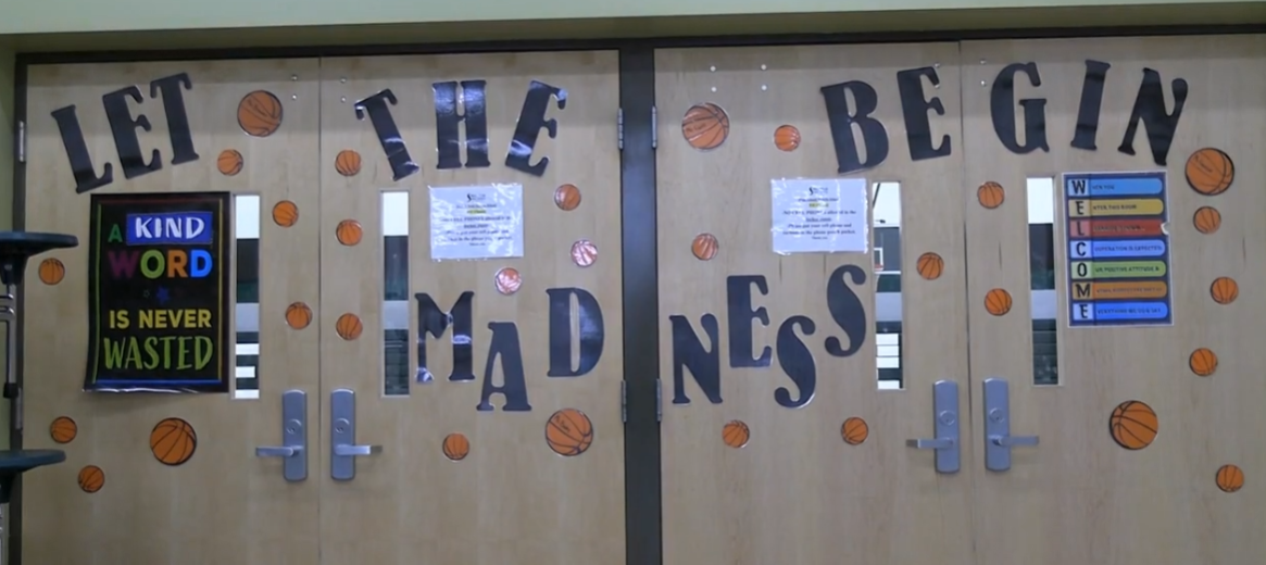 The Spectrum Middle School showing spirit for March Madness with decorations on gym doors